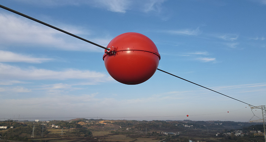 New designed aviation sphere markers are installed to electrical transmission line in Hubei